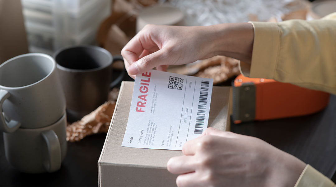 Shipping label being applied to a package